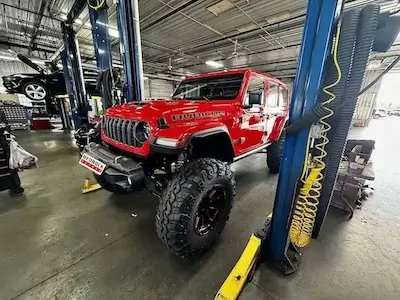 Bedrock Motors service technician working on a vehicle
